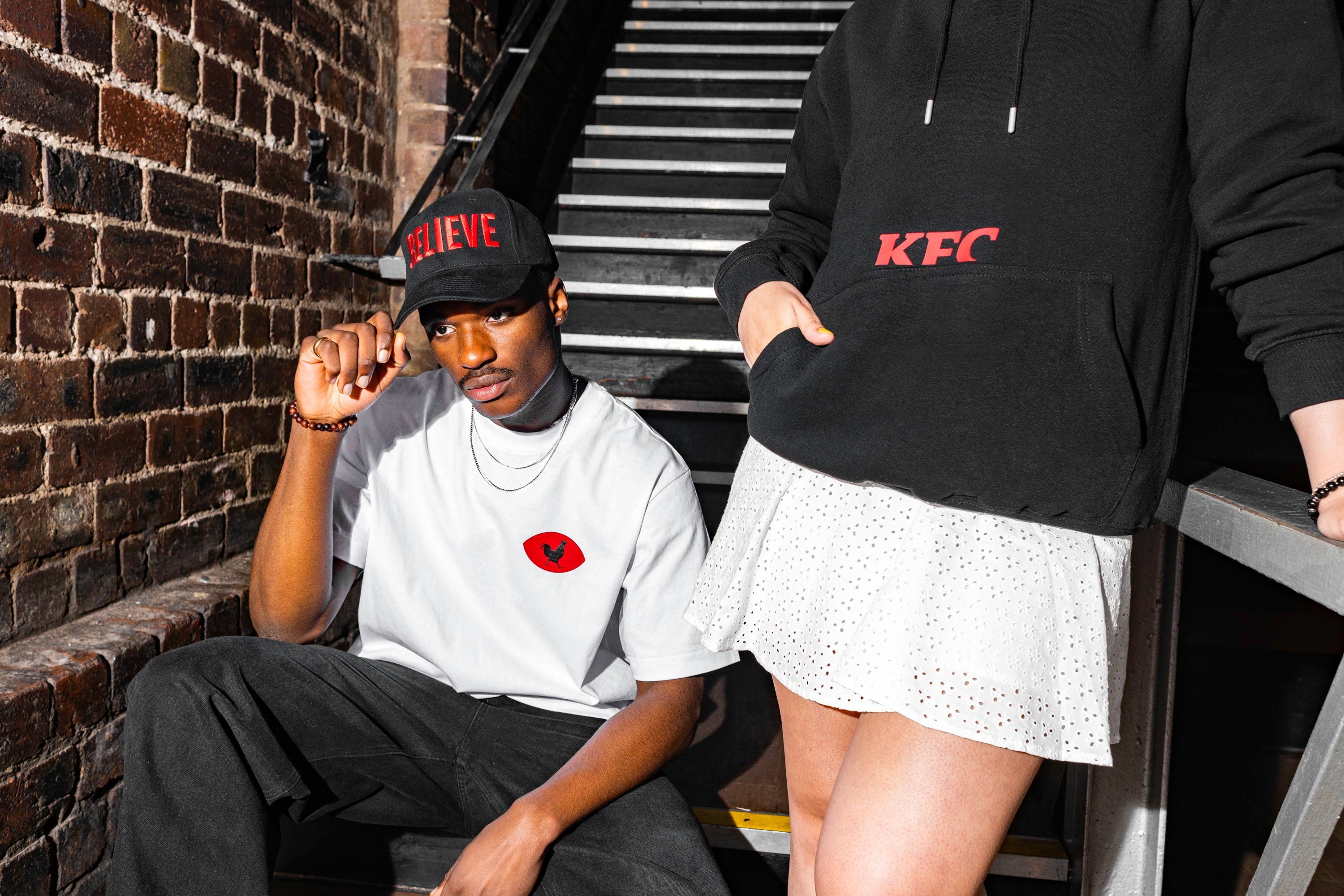 male and female models wearing KFC Believe apparel 